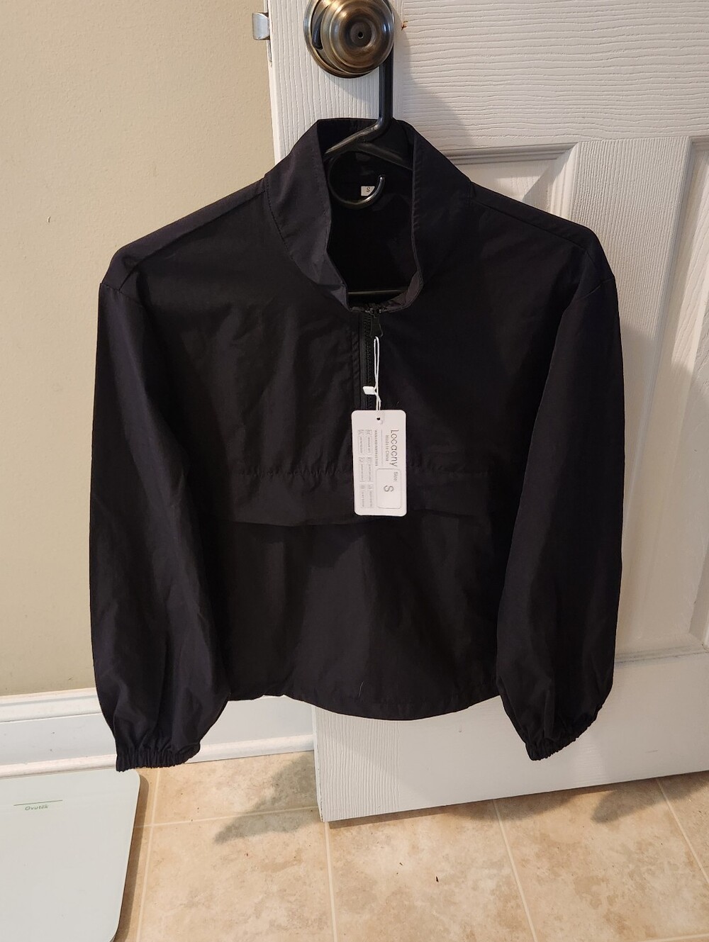 Locachy UPF windbreaker quarter zip. new with tags!